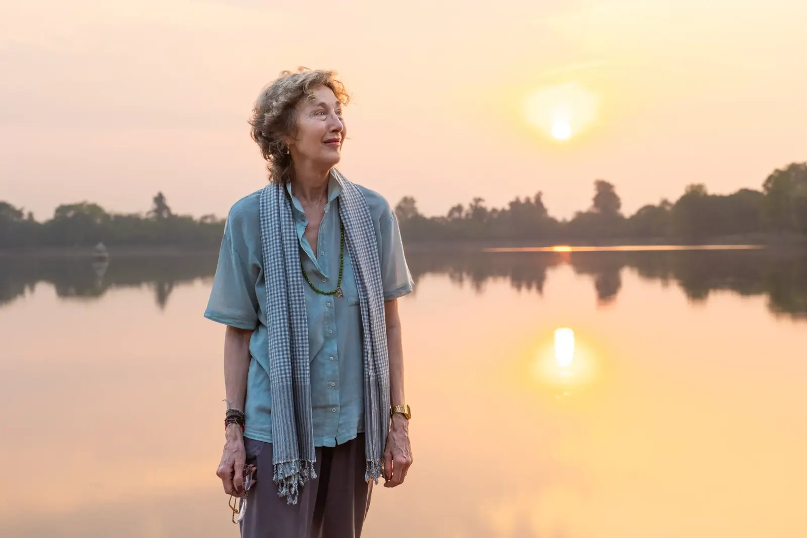 Susan at sunset by the lake - Cambodia retreat