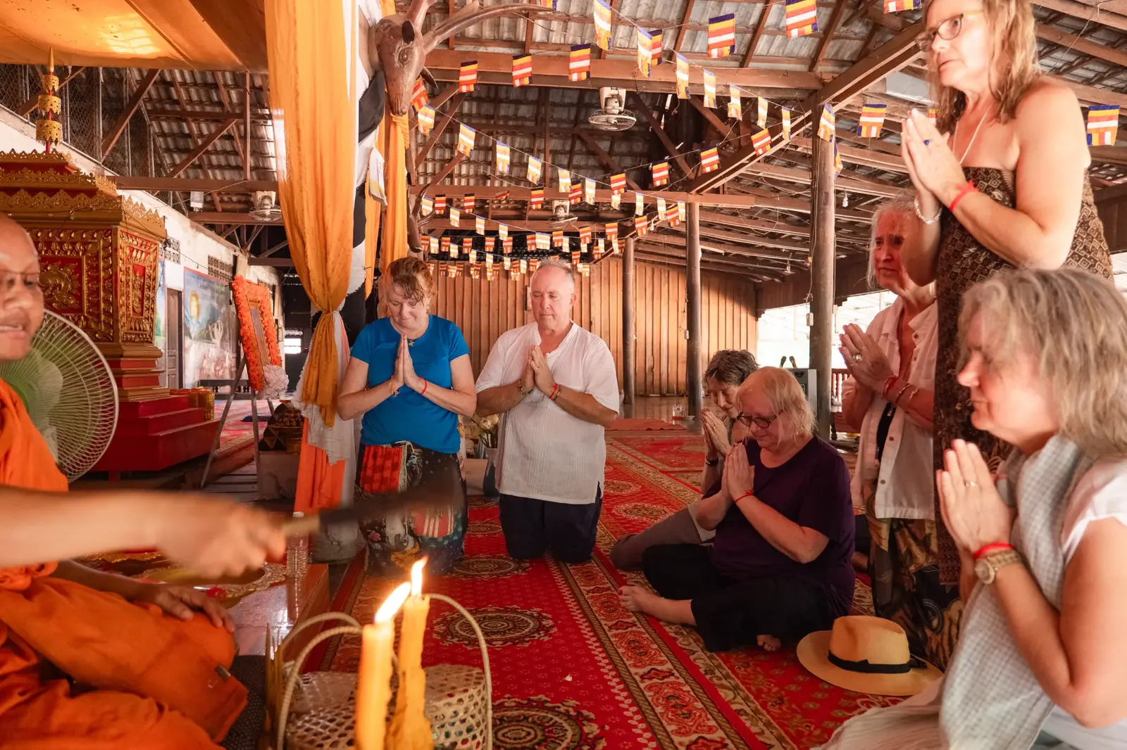 Retreat group with monks during blessing ceremony - Cambodia